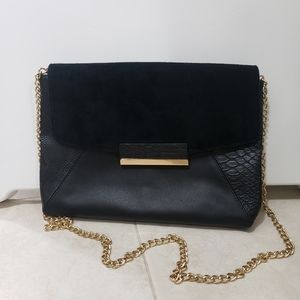 Aldo black and gold envelope clutch
